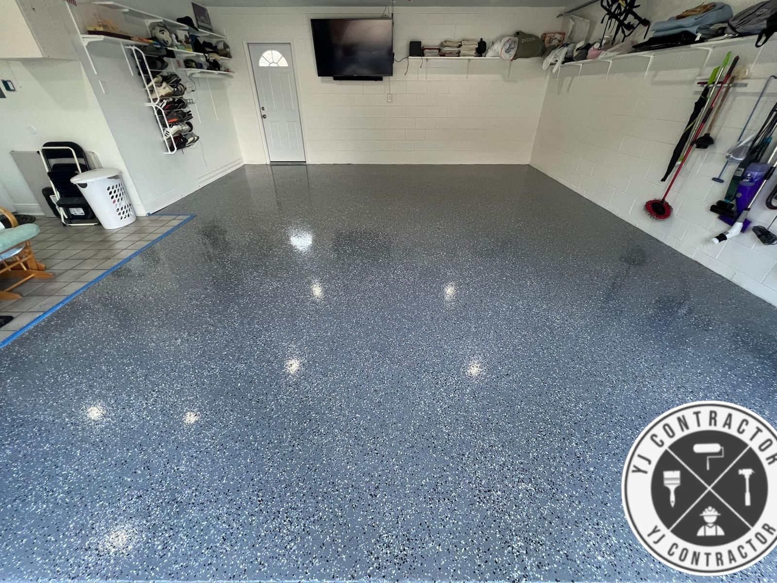 Finished gray flake epoxy floor in a garage