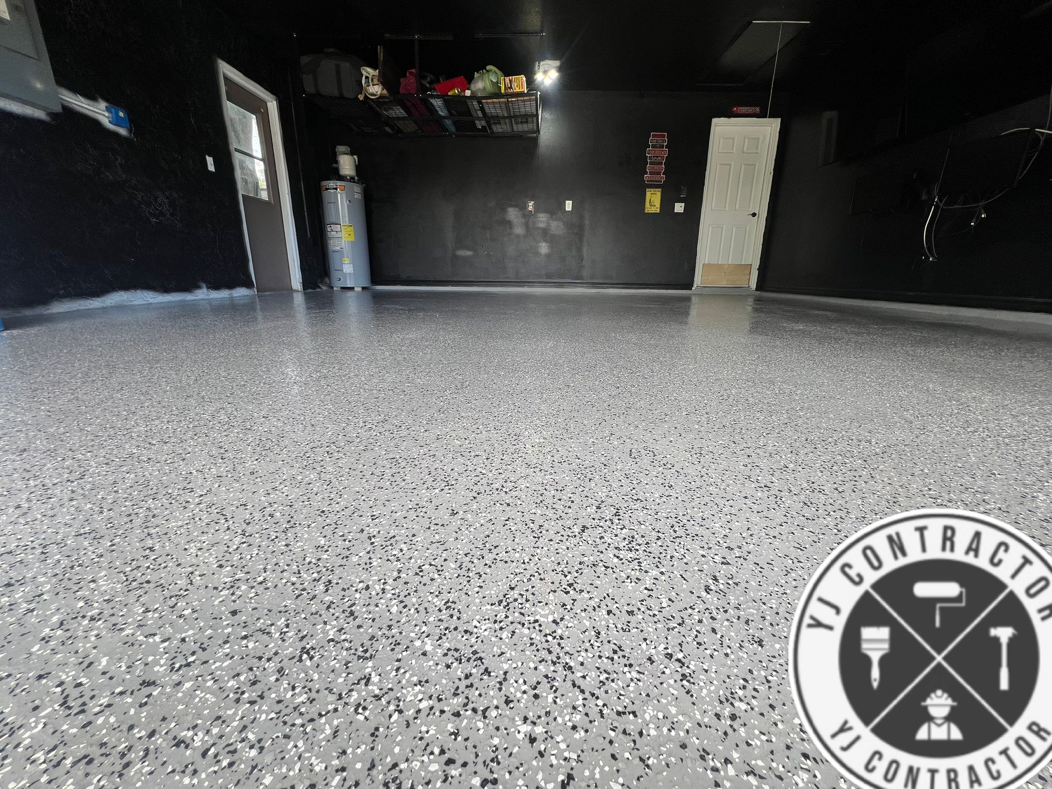 Light flake epoxy floor in a white garage