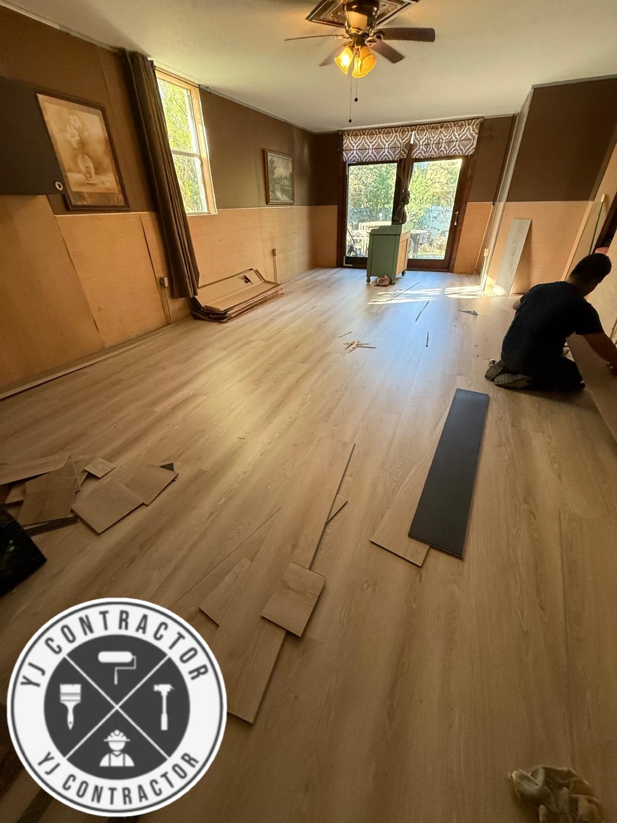 Flooring installation in progress in a living room