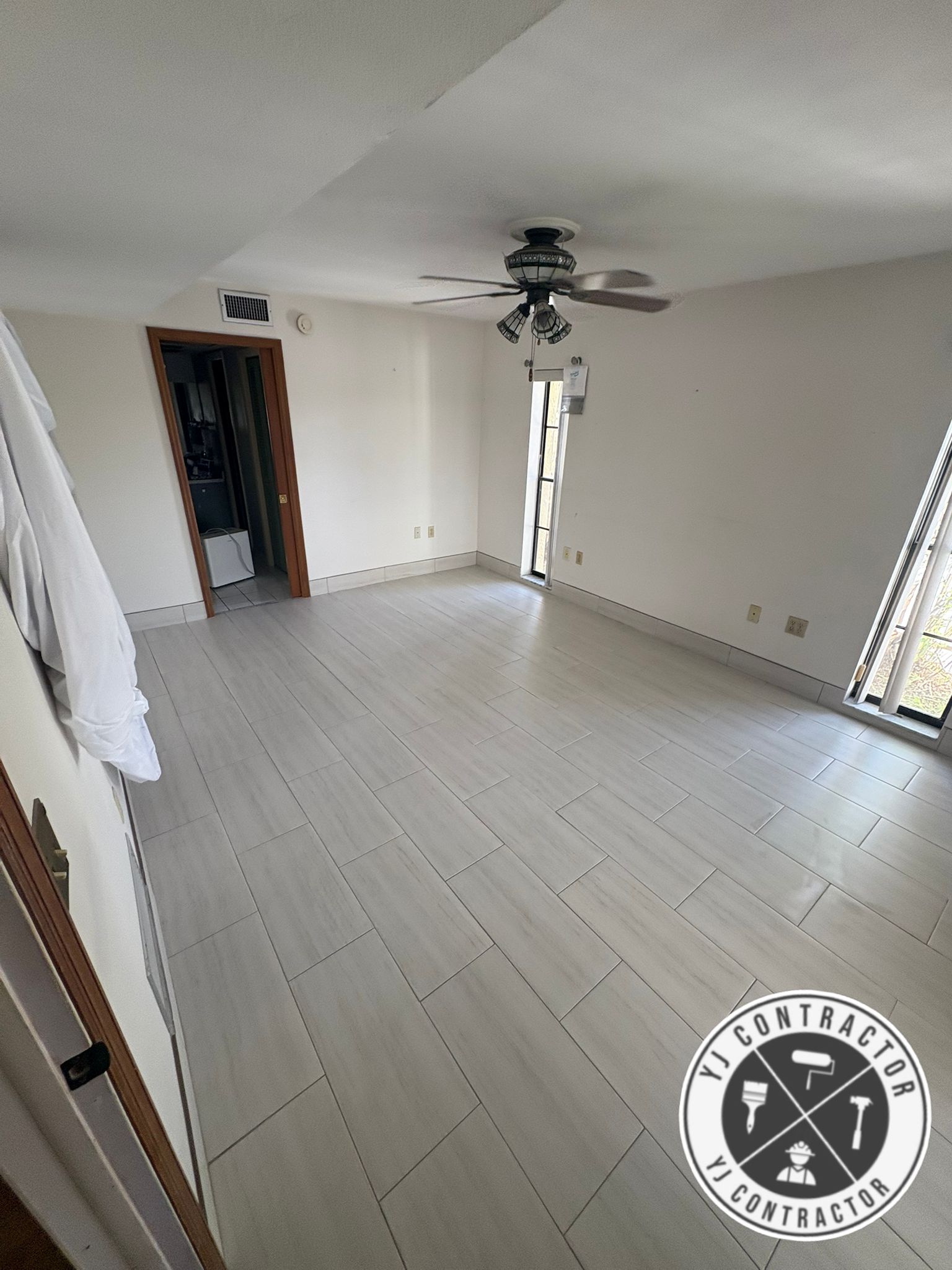 Finished gray floor tile in a living room