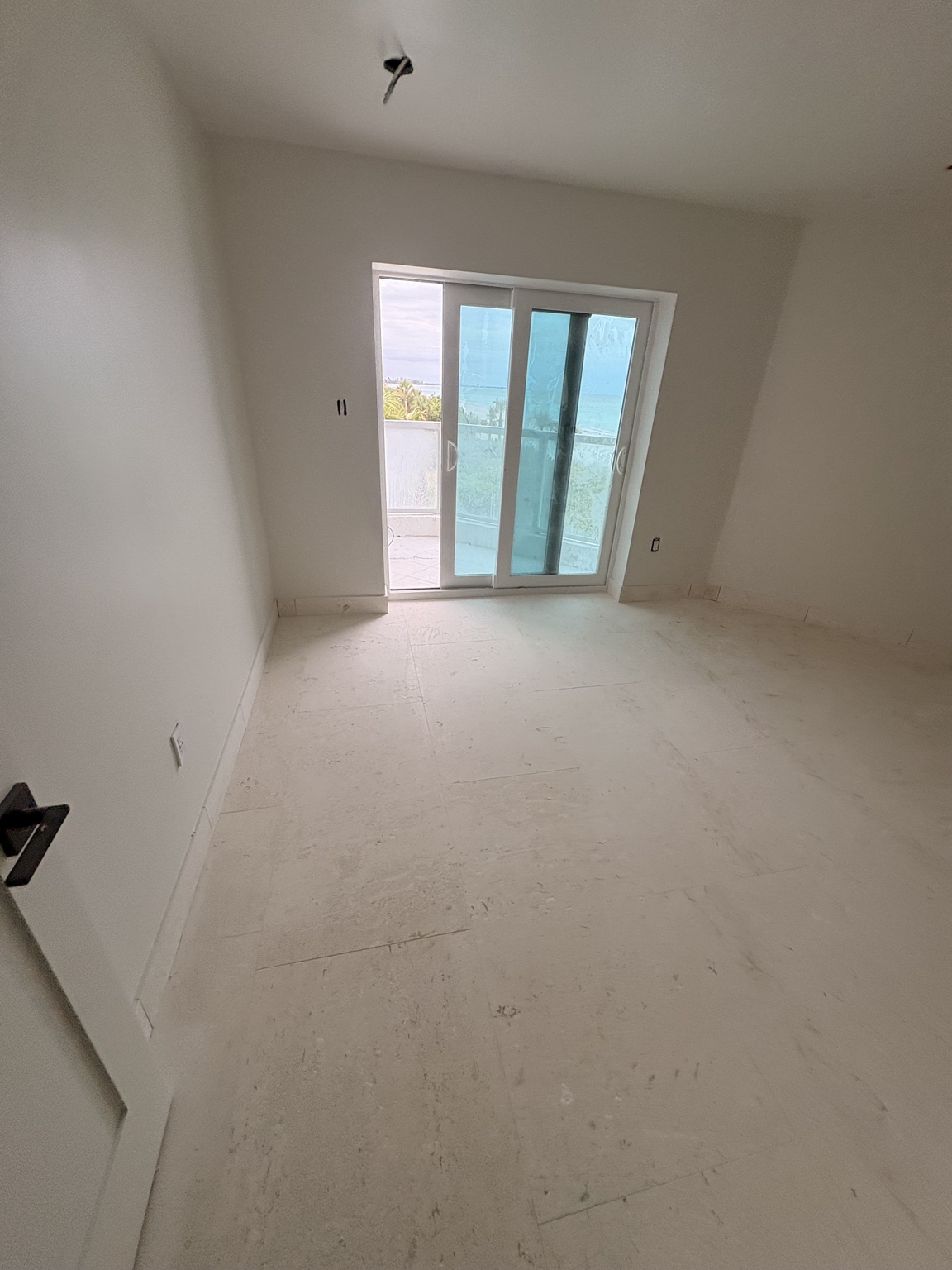 Light travertine floor in a finished room